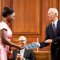 Robert Fritts, former U.S. ambassador to Ghana and Rwanda, distributed certifcates of completion to each of the YALI fellows.