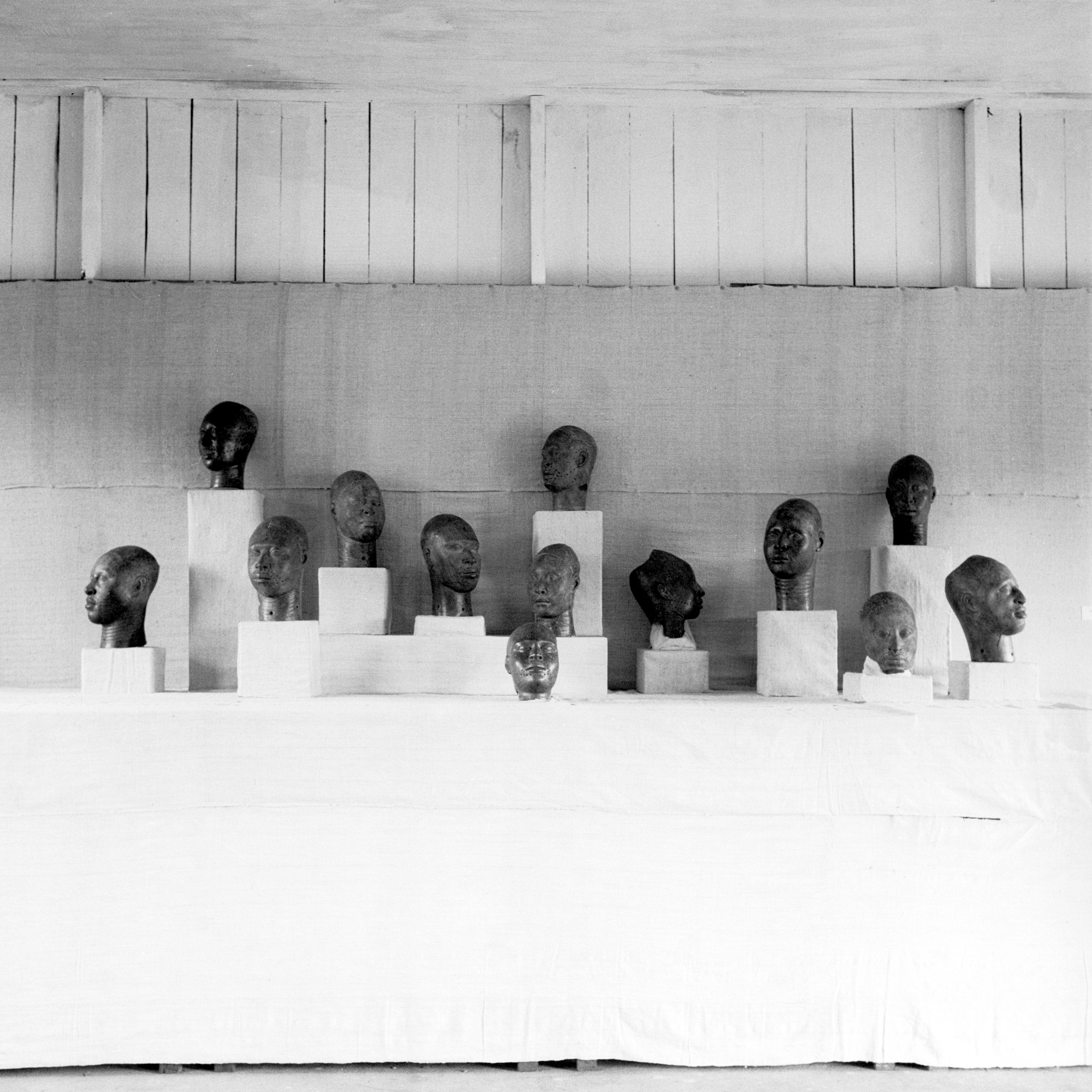 Image 3: Ifẹ̀ heads at an exhibition in Ibadan, Nigeria in 1949. Photograph by William Buller Fagg © RAI.