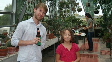 Current graduate student Mark Guillotte after helping set up, with Dr. Kerscher's daughter Stella.