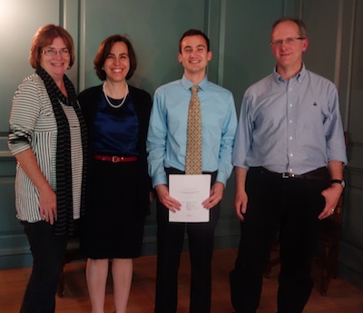 Brett with his thesis committee (l-r): Professors Kennedy, Panoussi, and Hutton