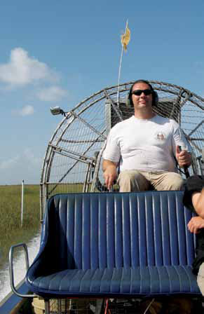 Timothy runs an airboat across the Everglades