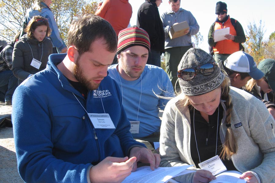 James McCulla ('10), Joe Quinn ('11), and Claire Still ('10) problem solving at Belle Island