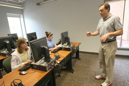 Peter Vishton works with a group of students in an ISC 2 computer facility dedicated to teaching. One of the 16 psychology laboratories in the Integrated Science Center complex is a computer lab dedicated to research. Unfortunately, that lab doesn't have any computers yet.