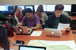 Students crowd the CGA for a GIS Day “mapathon,” in which volunteers remapped features in earthquake-stricken Afghanistan. CGA photo