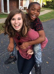 Isabella Bartels '18 with Bryce, one of the students who participates in the Lafayette Kids program (Photo by Elizabeth Ransone '18)
