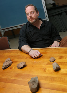 Norman found other ancient tools, including two Achulean hand axes, an awl and a scraper, whose ages vary from 100,000 to a million years old. (Photo by Stephen Salpukas)