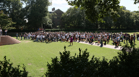 Members of the campus community gather in the Sunken Garden in September 2017 for a rally to support DACA students. (Photo by Stephen Salpukas)