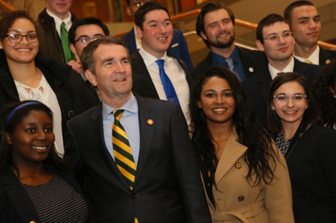 Gov. Ralph Northam poses for a photo with students. (Photo by Stephen Salpukas)