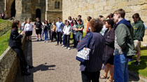 Wind Ensemble members listen to a tour guide at Alnwick Castle, England, which is where several Harry Potter movies were filmed. (Photo by Richard Marcus)