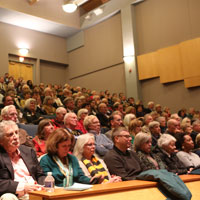 A capacity crowd listens to the Charter Day weekend discussion at William & Mary's Sadler Center Commonwealth Auditorium. (Photo by Stephen Salpukas)