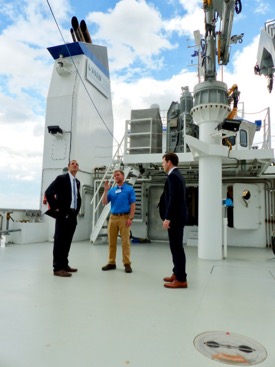 Taylor Moore (center), mate aboard the RV Virginia, describes the vessel's capabilities to Virginia Secretary of Natural Resources Matt Strickler (left) and W&M Board of Visitors member Will Payne (right) during a pre-christening tour. (Photo by D. Malmquist/VIMS)