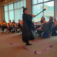 A person dressed in a Maleficent costume