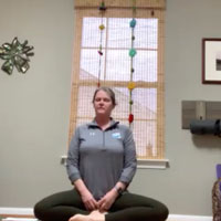 Patti DeBlass conducts a virtual morning yoga class.