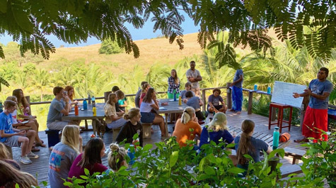 Verto Education students attend an outdoor cultural orientation class in Fiji.