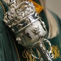 The top of a silver mace