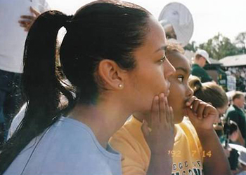 Nicole Lynn Lewis attends a football game with her daughter, Nerissa, while attending William &amp; Mary. (Courtesy of Nicole Lynn Lewis)