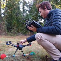 Timothy Boycott lands a drone at a survey site
