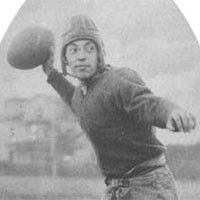 Vintage photograph of football player preparing to throw ball