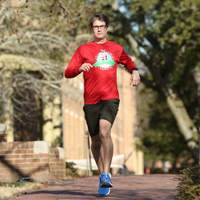 Marcus Holmes running on campus