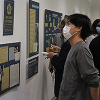 A W&M student viewing the P.K. Chen exhibit