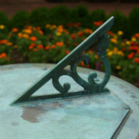 Closeup of sundial at Swem Library.