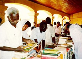 Books are distributed at Ahfad University. Image courtesy of SAFE.