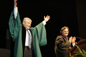 Sen. Hagel celebrates his appearance at the College while Nichol looks on. Photo by Stephen Salpukas