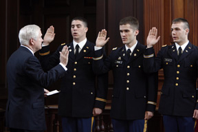 Gates swears in lieutenants at an ROTC affirmation ceremony during the 2007 commencement weekend.