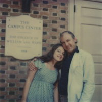 Christine Westberg and her father pose for a photo outside of the Campus Center.