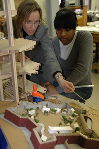 Shannon Chance (left) works with an architecture student at Hampton University.
