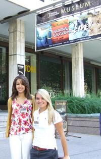 Brooke Anderson (left) and Erin Spencer, two of this year's new media fellows, pause for a photo at the National Geographic museum.