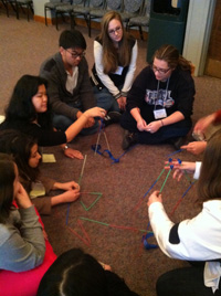Students work on a project together during the Catalyst program. Photo courtesy of Anne Arseneau.