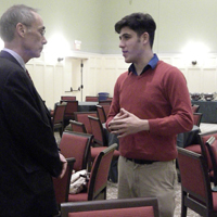Panelist and judge Sam Novey conversing with Charles Center Director Joel Schwartz/Jane M. Kim