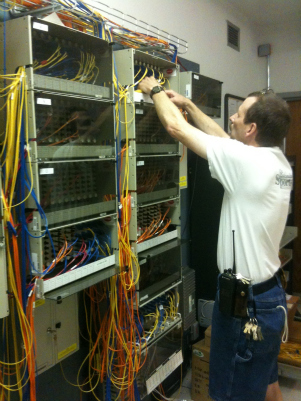 Jeff Jolly, network engineer, in one of the main networking hubs on campus