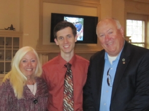 David Newbrander '13 with Jeanne and Don Weaver.