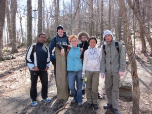 ISSP graduate assistant Wendy Couch (center) enjoying a hike with W&M international students.
