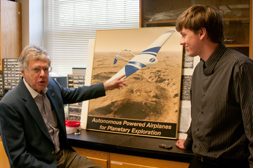 Research Professor Joel Levine  discusses the ARES Mars mission with W&M geology major Andrew Follett ’13