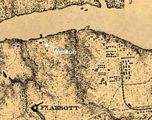 The earlest visual information about Weston Manor comes from a map drawn in the late stages of the Civil War (published 1867). Union cartographer Nathaniel Michler showed a vast area between Jordan's Point and Chesterfield Courthouse, but included such detail that we can distinguish five buildings at Weston. The arrow points to the mansion, flanked on either side by outbuildings. Two structures sit further back from the river, one along the right side of the farm road (dashed line) and another smaller structure southwest of the house. At this time and probably earlier, Weston also included a large pier directly in front of the house. Signs of war surround the plantation, with Fort Abbott to the south and the sprawling Union army hospital complex to the east. (Map from Library of Congress)