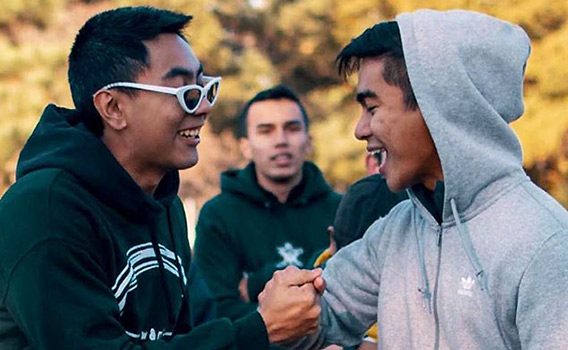 students in sweatshirts on a fall day