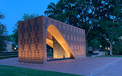 Hearth: Memorial to the Enslaved lit up at dusk