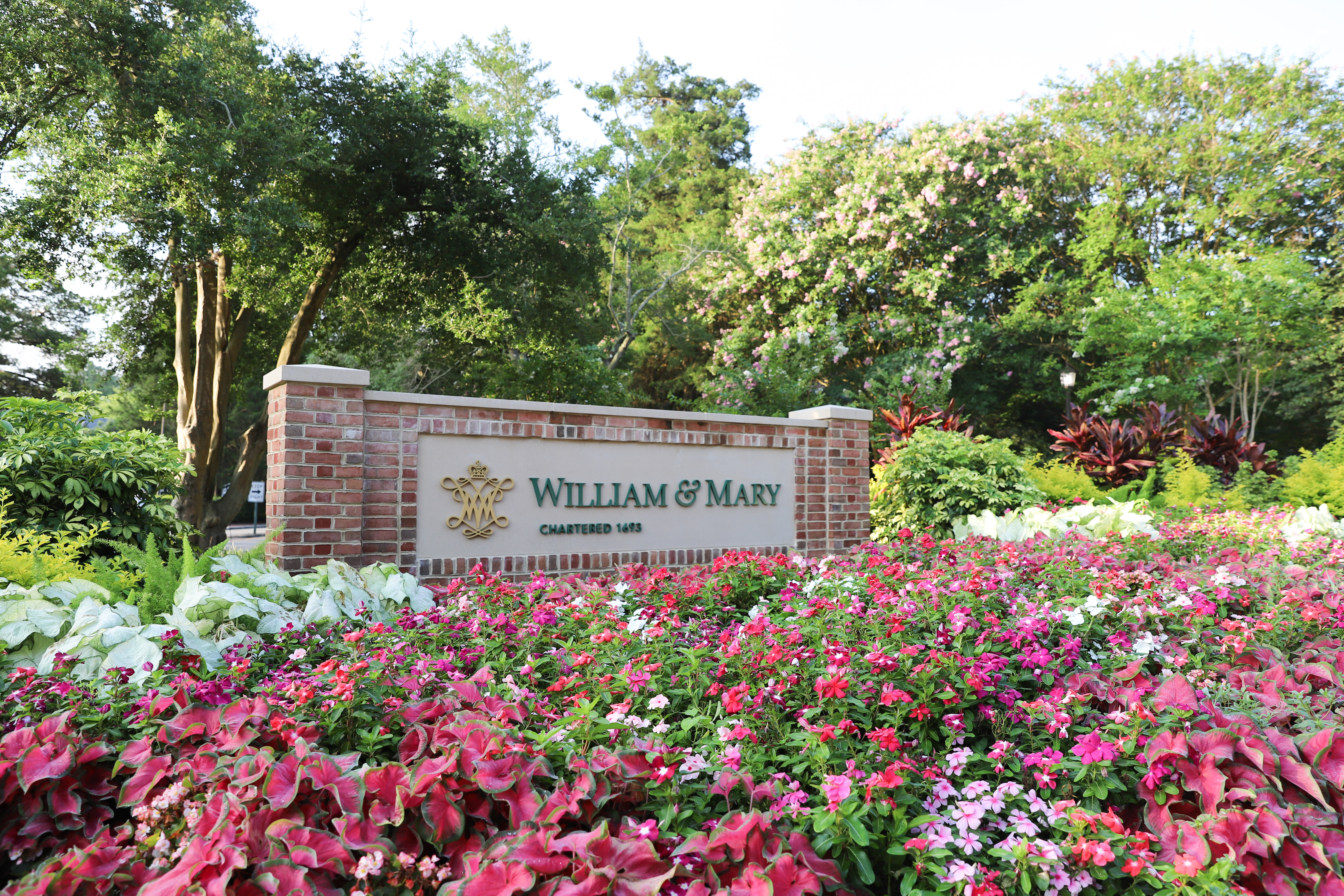 William & Mary sign surrounded by flowers
