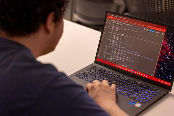 student types on computer