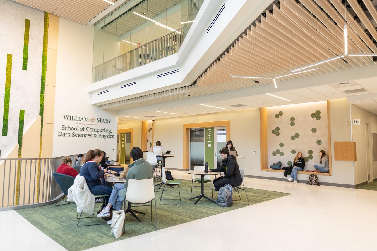 students hanging out and studying in the integrated science center 4 atrium
