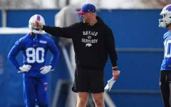 mcdermott pointing to other side of football field