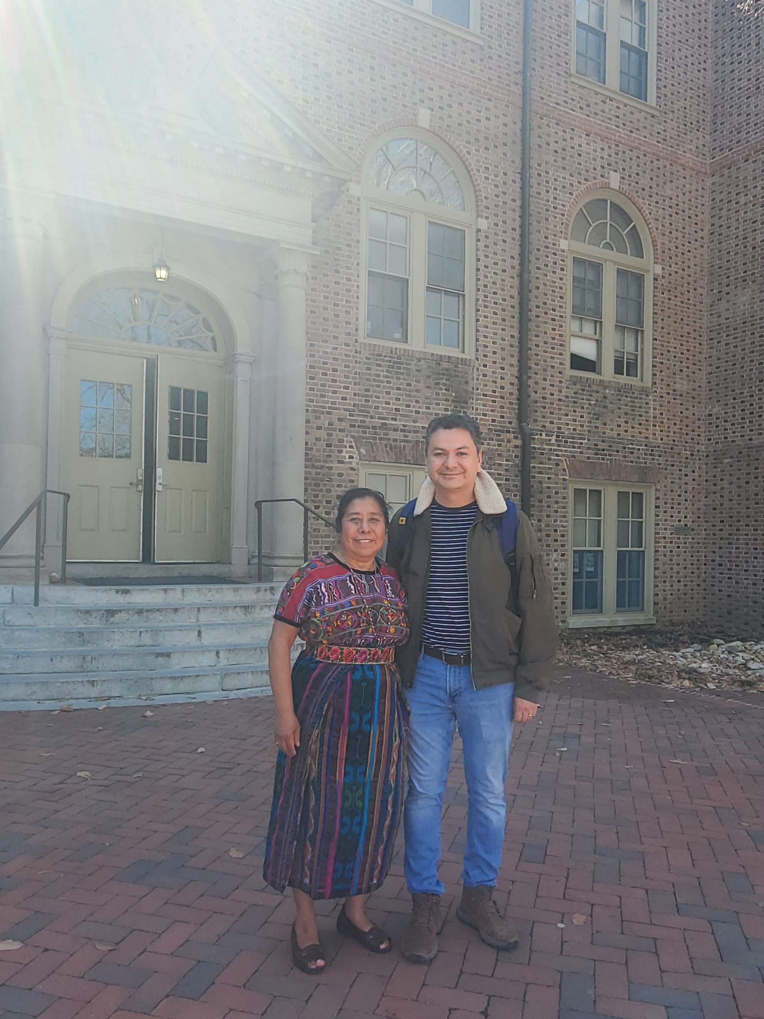 Maria and Sergio standing outside the entrance to Washinton Hall