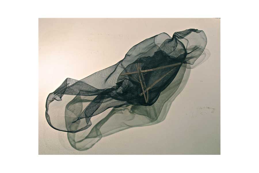 Study Model: A material study of wooden dowels and screen, exploring ways to interrelate previously divided spaces.  