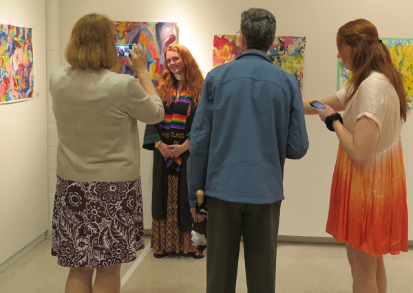 Annika Papke in front of her exhibited work