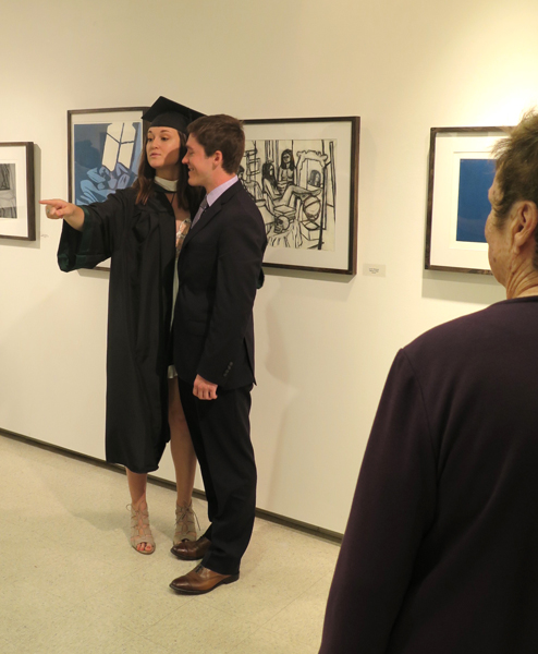 Lauren Reheuser in front of her exhibited work