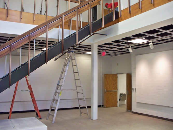Foyer first floor. Notice the open grid ceiling and additional track lighting for exhibitions.