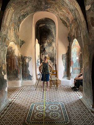 Cristina Stancioiu photographing the Church of St. Nicholas in Maza, Crete